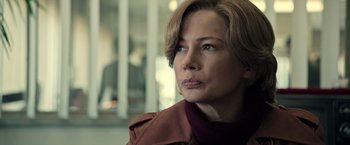 Movie still from “All the Money in the World” (2017), directed by Ridley Scott – A person wearing a jacket; Close Up shot, Over the shoulder angle