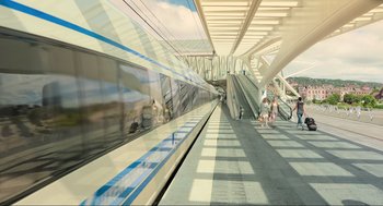 Movie still from “Gemini Man” (2019), directed by Ang Lee – People are waiting for a train at a train station; Extreme Wide shot, High angle