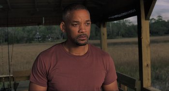 Movie still from “Gemini Man” (2019), directed by Ang Lee – A person wearing a t - shirt; Close Up shot, Over the shoulder angle