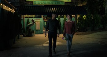 Movie still from “Gemini Man” (2019), directed by Ang Lee – A man and a woman walking down a street; Wide shot, Low angle