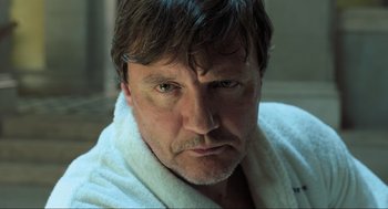 Movie still from “Gemini Man” (2019), directed by Ang Lee – A person wearing a robe; Close Up shot, Low angle