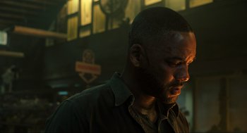 Movie still from “Gemini Man” (2019), directed by Ang Lee – A person wearing a shirt; Close Up shot, Low angle