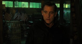 Movie still from “Gemini Man” (2019), directed by Ang Lee – A person wearing a jacket; Close Up shot, Over the shoulder angle