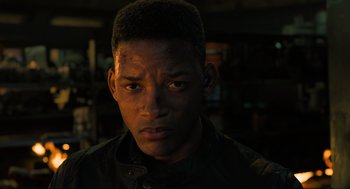 Movie still from “Gemini Man” (2019), directed by Ang Lee – A person wearing a black jacket; Close Up shot, Low angle