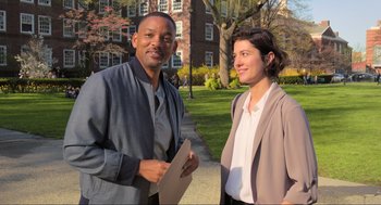 Movie still from “Gemini Man” (2019), directed by Ang Lee – A man and a woman standing next to each other on a sidewalk; Medium shot, Low angle