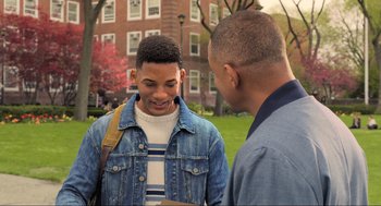 Movie still from “Gemini Man” (2019), directed by Ang Lee – Two young men are standing outside talking to each other; Medium shot, Over the shoulder angle