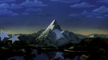 Movie still from “Ghost” (1990), directed by Jerry Zucker – A painting of a mountain with a lake in the background; Extreme Wide shot, Low angle