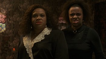 Movie still from “Ghost” (1990), directed by Jerry Zucker – A couple of women standing next to each other; Close Up shot, Low angle