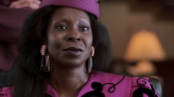 Movie still from “Ghost” (1990), directed by Jerry Zucker – A person wearing a hat; Close Up shot, Low angle