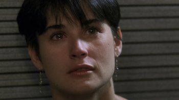 Movie still from “Ghost” (1990), directed by Jerry Zucker – A woman's eyes and face; Close Up shot, Over the shoulder angle