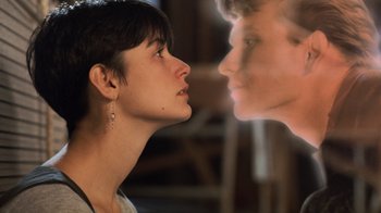 Movie still from “Ghost” (1990), directed by Jerry Zucker – A woman and a man face to face in front of each other; Close Up shot, Over the shoulder angle