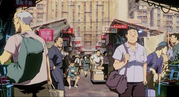 Movie still from “Ghost in the Shell” (1995), directed by Mamoru Oshii – An illustration of people walking down a busy street; Wide shot, Low angle