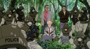Movie still from “Ghost in the Shell” (1995), directed by Mamoru Oshii – A group of people in the woods with guns; Wide shot, High angle