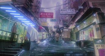 Movie still from “Ghost in the Shell” (1995), directed by Mamoru Oshii – People walking down a street in an asian city; Extreme Wide shot, Low angle