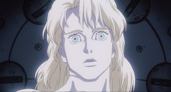 Movie still from “Ghost in the Shell” (1995), directed by Mamoru Oshii – A woman's face in a movie scene; Close Up shot, Low angle