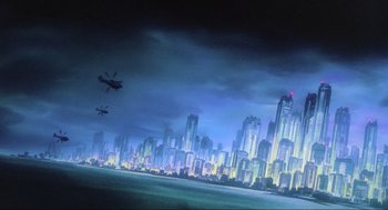 Movie still from “Ghost in the Shell” (1995), directed by Mamoru Oshii – An airplane flying over a large city at night time; Extreme Wide shot, Low angle