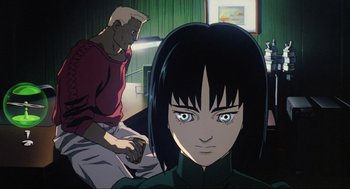 Movie still from “Ghost in the Shell” (1995), directed by Mamoru Oshii – An animated scene of a man and a woman in a room; Close Up shot, Low angle