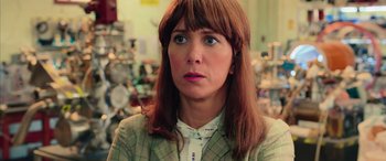 Movie still from “Ghostbusters” (2016), directed by Paul Feig – A person wearing a jacket; Close Up shot, Over the shoulder angle