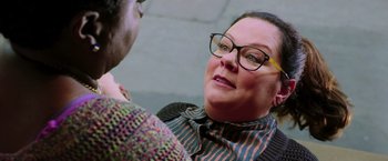 Movie still from “Ghostbusters” (2016), directed by Paul Feig – An older woman wearing glasses talking to a younger person; Close Up shot, Over the shoulder angle