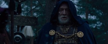 Movie still from “Gladiator” (2000), directed by Ridley Scott – An old man dressed as a medieval knight; Medium shot, Low angle