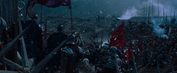Movie still from “Gladiator” (2000), directed by Ridley Scott – A group of people in medieval armor on a snowy day; Extreme Wide shot, High angle