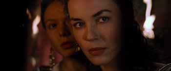 Movie still from “Gladiator” (2000), directed by Ridley Scott – A woman and a boy are looking at the camera; Close Up shot, Over the shoulder angle