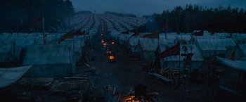 Movie still from “Gladiator” (2000), directed by Ridley Scott – A group of tents that are in the dirt; Extreme Wide shot, High angle
