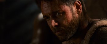 Movie still from “Gladiator” (2000), directed by Ridley Scott – A person with a beard looking at the camera; Close Up shot, Over the shoulder angle