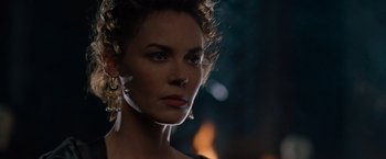 Movie still from “Gladiator” (2000), directed by Ridley Scott – A person wearing earrings; Close Up shot, Over the shoulder angle