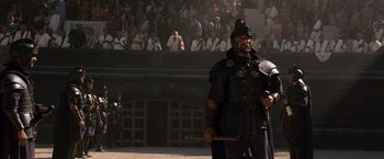 Movie still from “Gladiator” (2000), directed by Ridley Scott – A man dressed as a roman soldier in front of a crowd; Wide shot, Over the shoulder angle