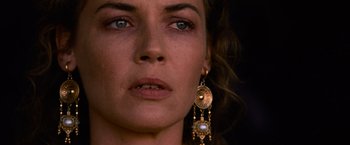 Movie still from “Gladiator” (2000), directed by Ridley Scott – A person wearing a gold earring; Close Up shot, Over the shoulder angle
