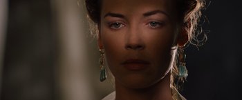 Movie still from “Gladiator” (2000), directed by Ridley Scott – A person wearing earrings; Close Up shot, Over the shoulder angle