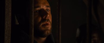 Movie still from “Gladiator” (2000), directed by Ridley Scott – A person with a beard looking at the camera; Close Up shot, Low angle