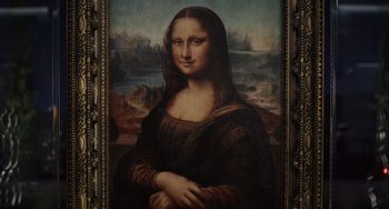 Movie still from “Glass Onion” (2022), directed by Rian Johnson – A painting of mona lisa is displayed in a frame; Close Up shot, High angle