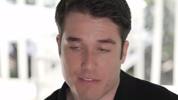 Movie still from “God Forbid” (2022), directed by Billy Corben – A man's face with his eyes wide open; Extreme Close Up shot, Low angle