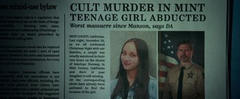 Movie still from “God Is a Bullet” (2023), directed by Nick Cassavetes – A newspaper article with a picture of a woman; Extreme Close Up shot, Overhead angle