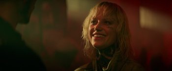 Movie still from “God Is a Bullet” (2023), directed by Nick Cassavetes – A person with tattoos on her face; Close Up shot, Low angle