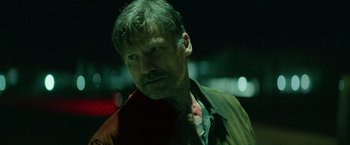 Movie still from “God Is a Bullet” (2023), directed by Nick Cassavetes – A person wearing a jacket; Close Up shot, Low angle