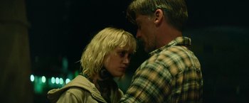 Movie still from “God Is a Bullet” (2023), directed by Nick Cassavetes – A man and a woman standing next to each other; Close Up shot, Over the shoulder angle