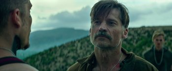 Movie still from “God Is a Bullet” (2023), directed by Nick Cassavetes – A person with a beard and mustache; Close Up shot, Low angle