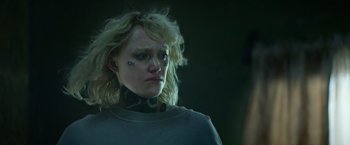 Movie still from “God Is a Bullet” (2023), directed by Nick Cassavetes – A woman with tattoos on her face and neck; Close Up shot, Low angle