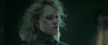 Movie still from “God Is a Bullet” (2023), directed by Nick Cassavetes – A woman with a tattoo on her face; Close Up shot, Low angle