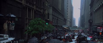 Movie still from “Godzilla” (1998), directed by Roland Emmerich – A bunch of people that are standing in the street; Extreme Wide shot, High angle