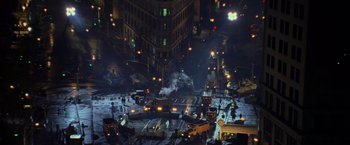 Movie still from “Godzilla” (1998), directed by Roland Emmerich – A city street filled with lots of traffic at night; Extreme Wide shot, High angle