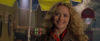 Movie still from “Godzilla” (1998), directed by Roland Emmerich – A person smiling for a picture; Close Up shot, Over the shoulder angle