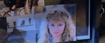Movie still from “Godzilla” (1998), directed by Roland Emmerich – A picture of a girl; Extreme Close Up shot, High angle