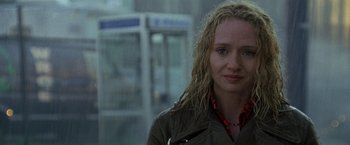 Movie still from “Godzilla” (1998), directed by Roland Emmerich – A person wearing a jacket; Close Up shot, Over the shoulder angle