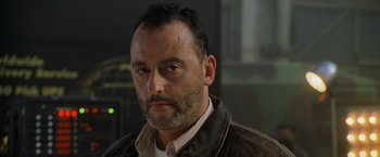 Movie still from “Godzilla” (1998), directed by Roland Emmerich – A person wearing a jacket; Close Up shot, Low angle