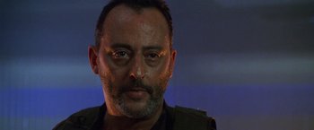 Movie still from “Godzilla” (1998), directed by Roland Emmerich – A person wearing a jacket; Close Up shot, Low angle