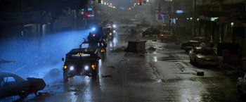 Movie still from “Godzilla” (1998), directed by Roland Emmerich – A city street with a lot of cars on the road; Extreme Wide shot, High angle